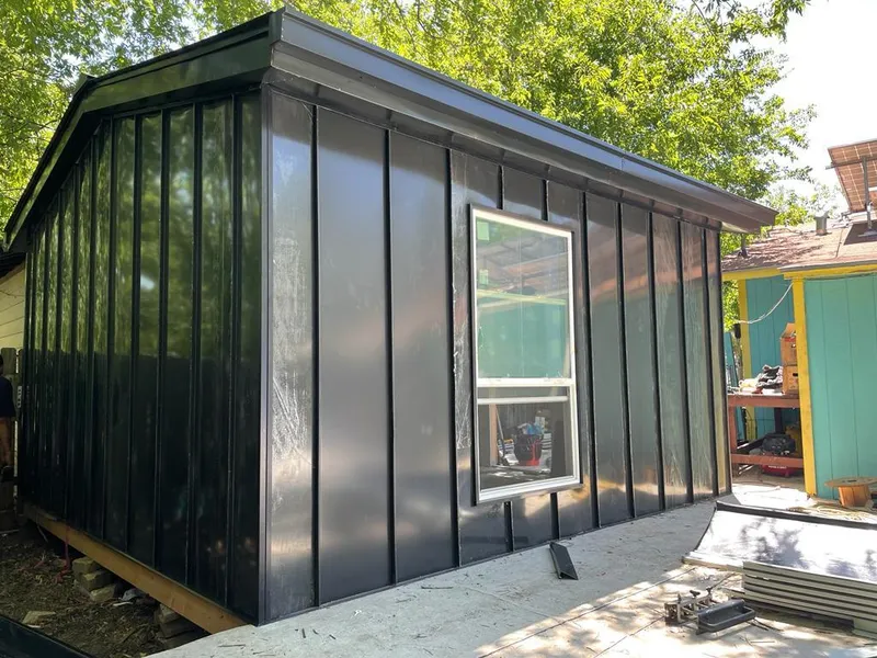 Black standing seam metal wall panels for Roof Inspection in Glassboro